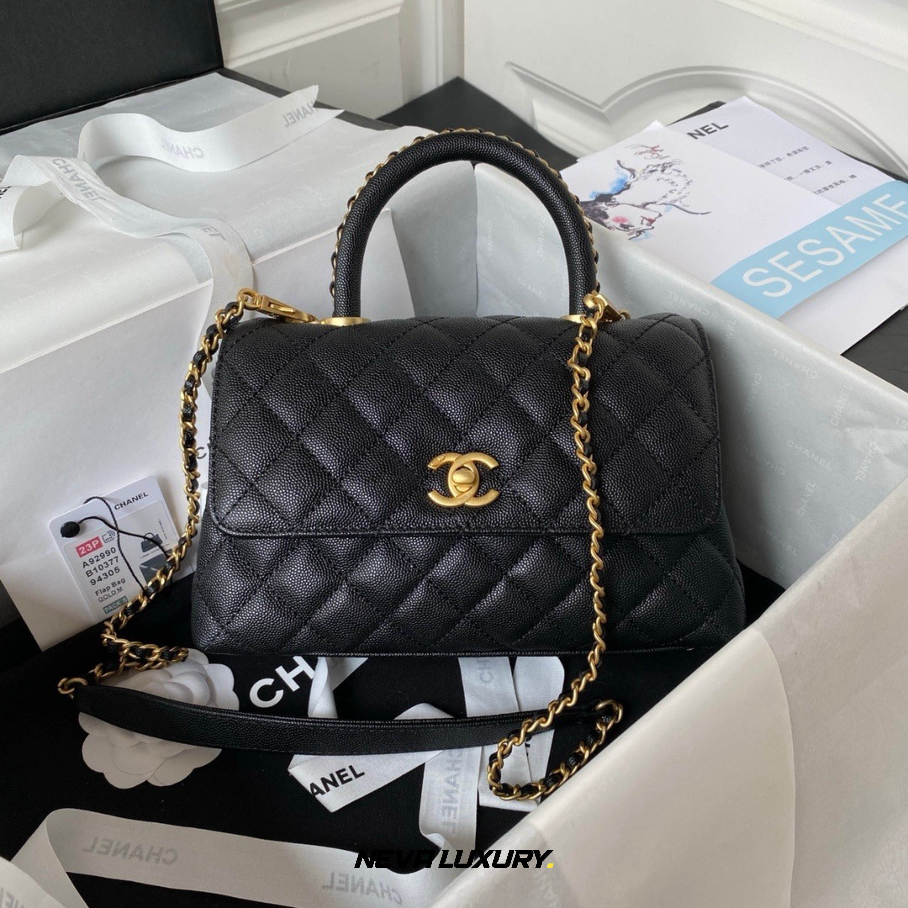 Sac à rabat avec poignée